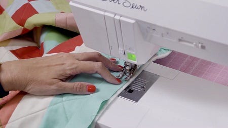 Sew the binding strip to your quilt top